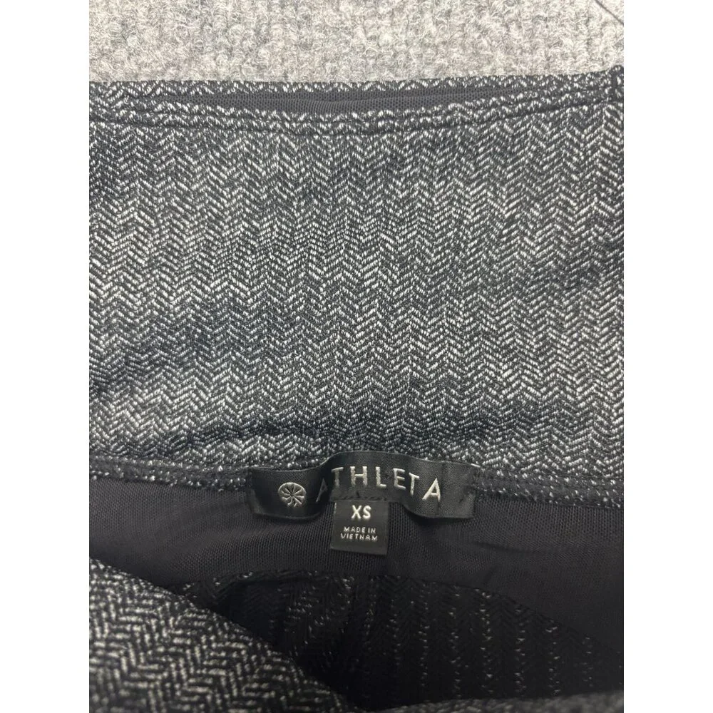 Athleta Tight Crop Pants Leggings Women's XS Black White 2 Zip Pockets Slit Hem - Picture 2 of 8